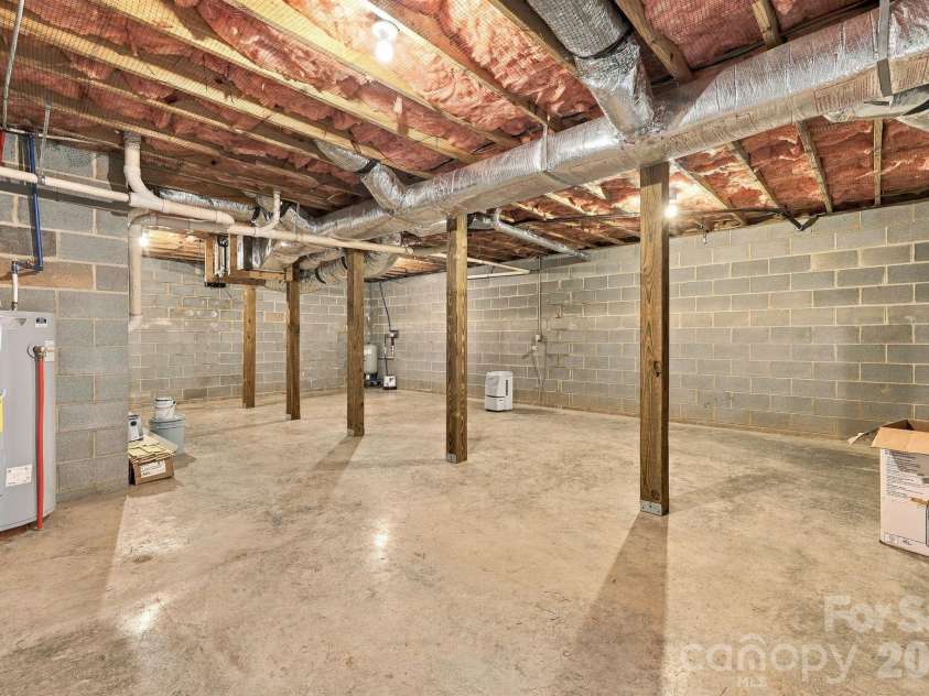 117 Ho Hum Way, Leicester, NC 28748.  MLS# CAR4422890, YatesRealty ID 51054. Spacious Basement with many possibilities