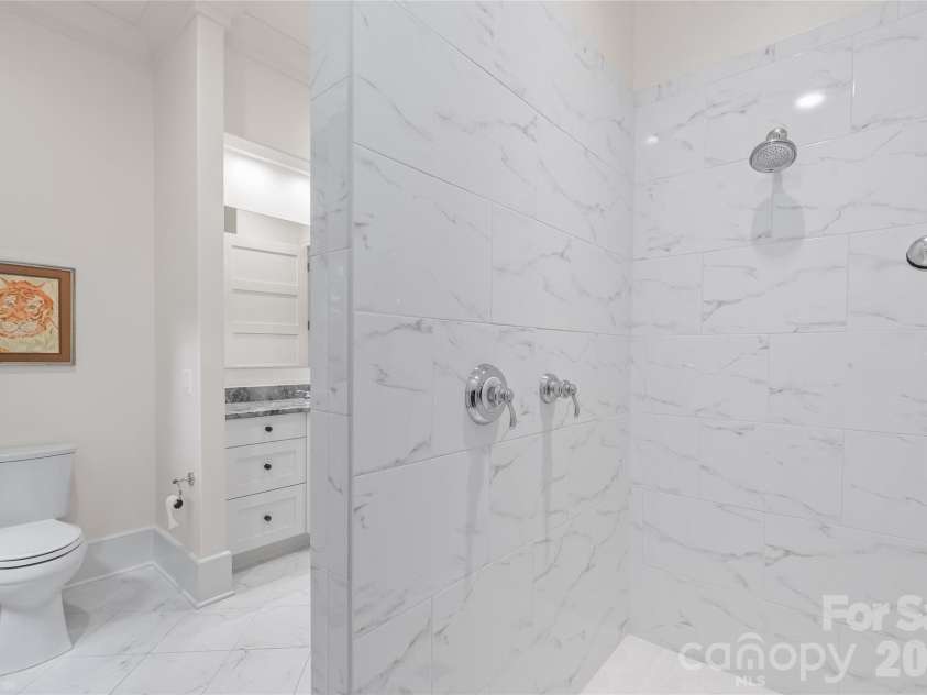 2800 Wintergreen Drive, Charlotte, NC 28211.  MLS# CAR4410831, YatesRealty ID 51056. An oversized zero entry shower completes this bath