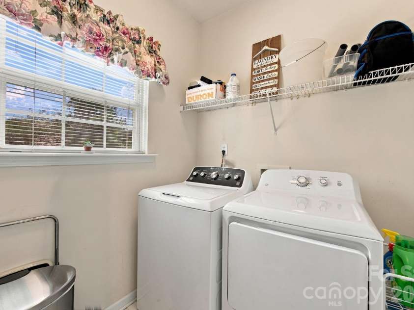 2807 Edgebrook Circle, Matthews, NC 28105.  MLS# CAR4424459, YatesRealty ID 51082. Window and Drop Down Ironing Board