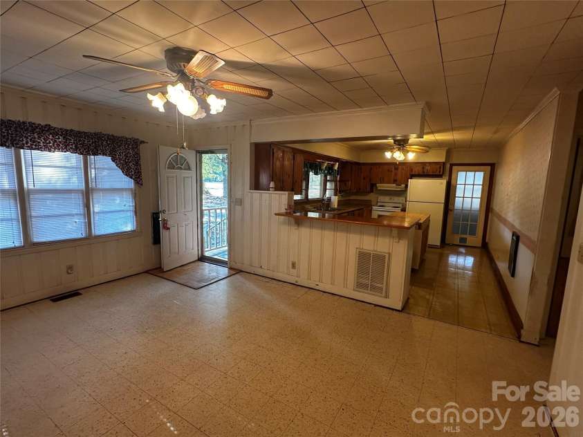 1093 Evans Mill Road, Pageland, SC 29728.  MLS# CAR4425268, YatesRealty ID 51093. Den/dining area looking towards kitchen.