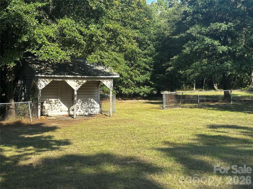 1093 Evans Mill Road, Pageland, SC 29728.  MLS# CAR4425268, YatesRealty ID 51093. Spacious back yard