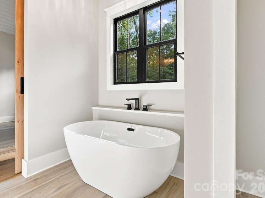 3515 Capricorn Road, Lancaster, SC 29720.  MLS# CAR4424668, YatesRealty ID 51098. Primary bath soaker tub.