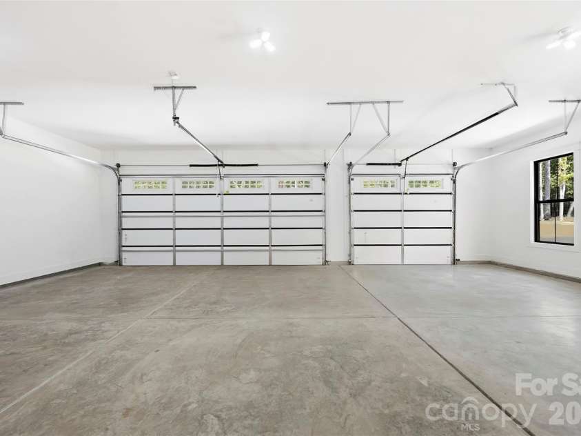 3515 Capricorn Road, Lancaster, SC 29720.  MLS# CAR4424668, YatesRealty ID 51098. Three car garage.