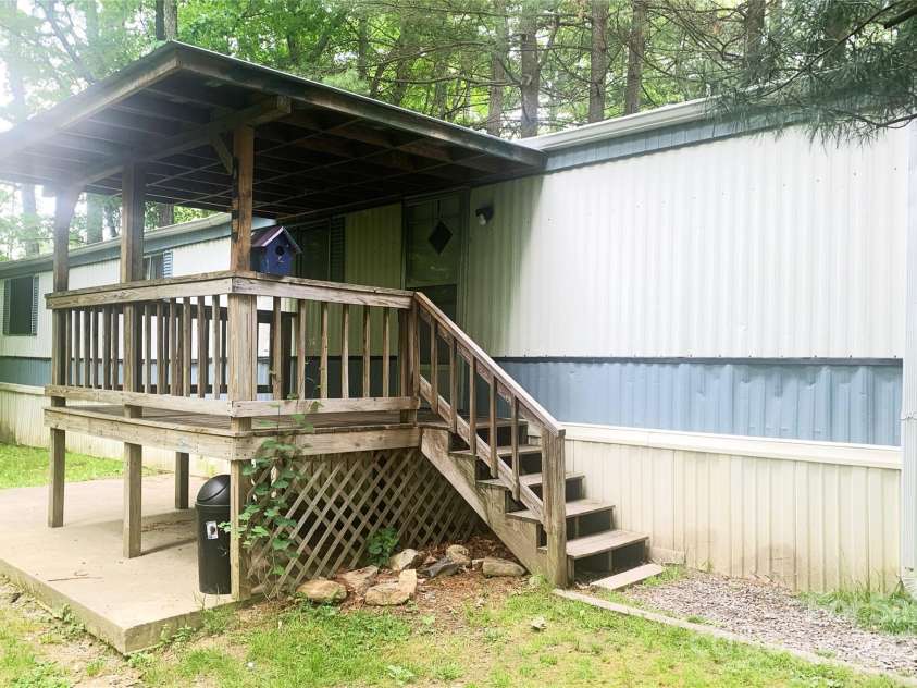 295 Asbury Road, Candler, NC 28715.  MLS# CAR4308375, YatesRealty ID 511. 