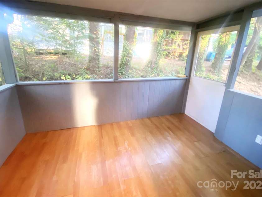 295 Asbury Road, Candler, NC 28715.  MLS# CAR4308375, YatesRealty ID 511. 