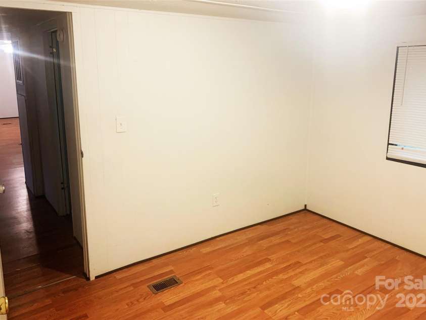 295 Asbury Road, Candler, NC 28715.  MLS# CAR4308375, YatesRealty ID 511. 