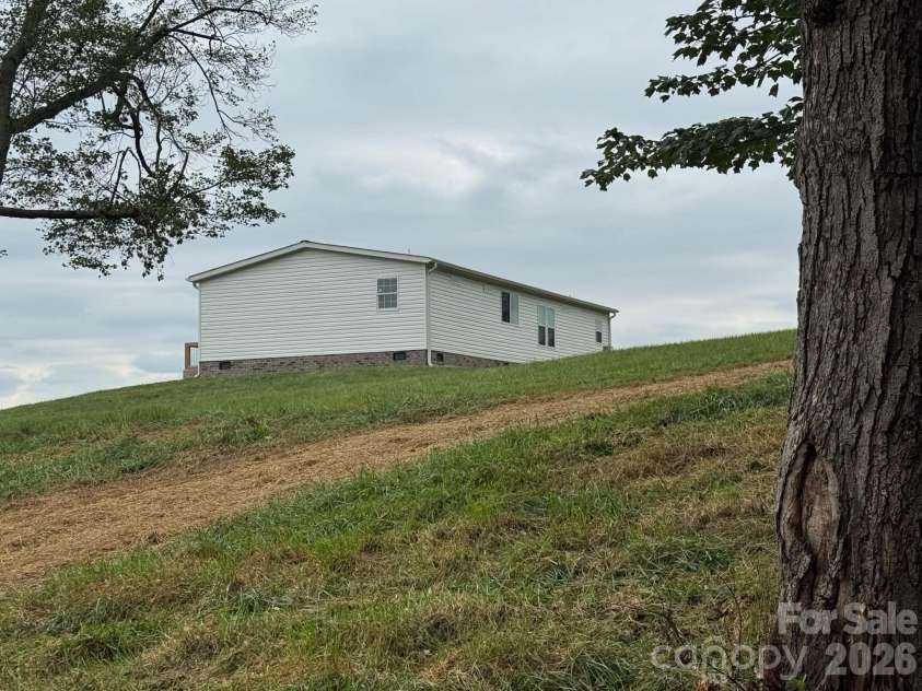 239 Southard Road, Elkin, NC 28621.  MLS# CAR4425338, YatesRealty ID 51102. 