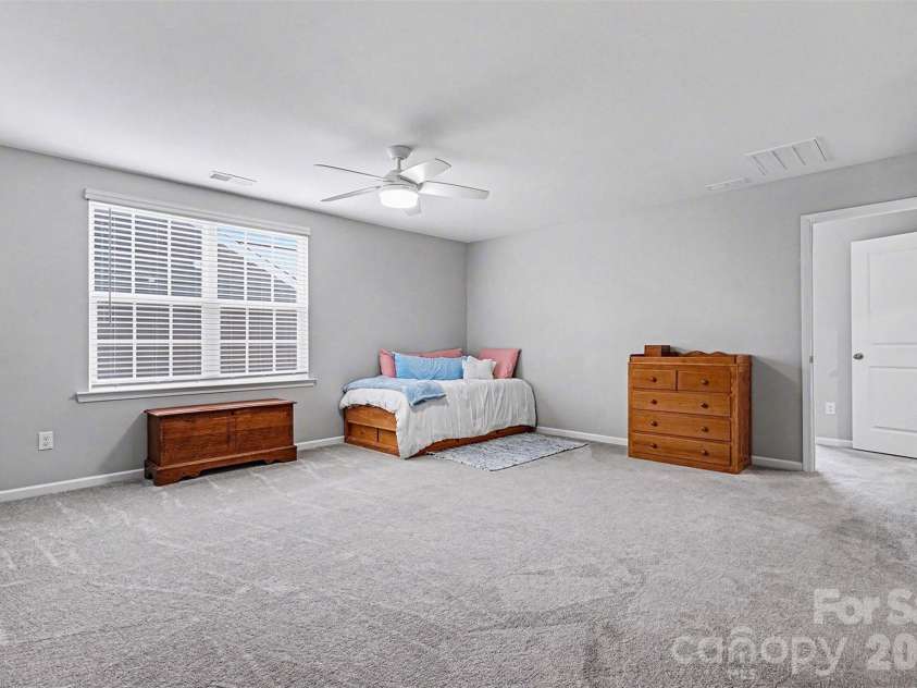 310 Hamptons Cove Road, Troutman, NC 28166.  MLS# CAR4355239, YatesRealty ID 5113. 2nd story oversized loft/flex space