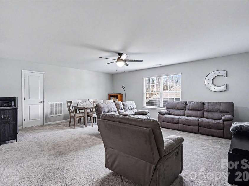 310 Hamptons Cove Road, Troutman, NC 28166.  MLS# CAR4355239, YatesRealty ID 5113. 3rd story multipurpose room is massive.