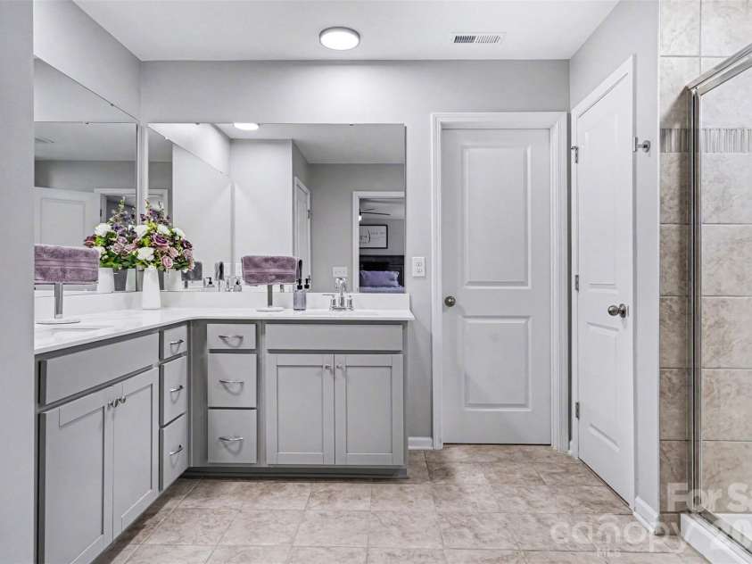 310 Hamptons Cove Road, Troutman, NC 28166.  MLS# CAR4355239, YatesRealty ID 5113. Spa-like primary bathroom