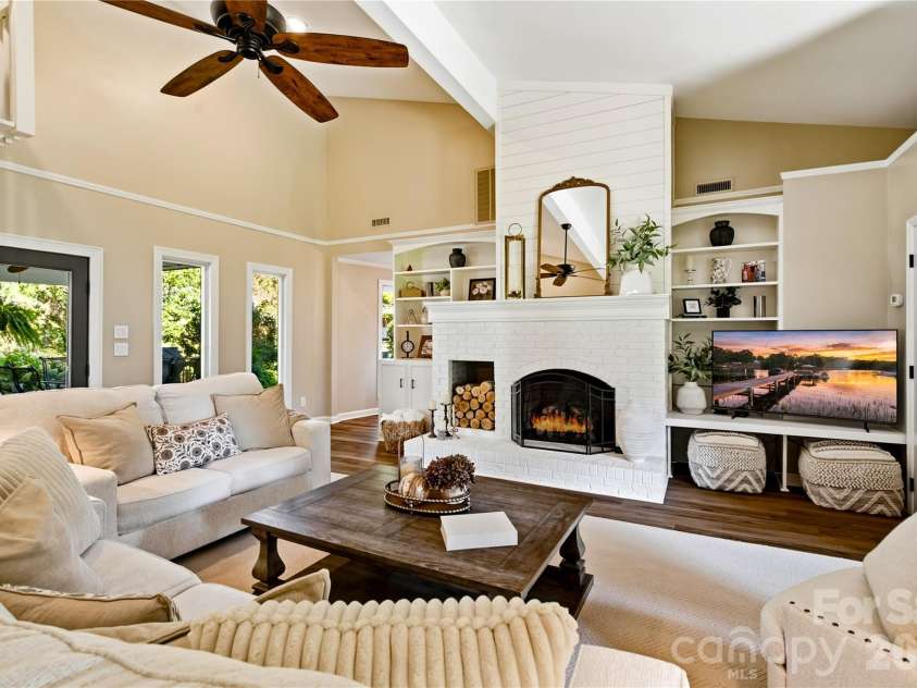 8172 Malibu Pointe Lane, Denver, NC 28037.  MLS# CAR4424504, YatesRealty ID 51133. Warm and inviting great room with gas fireplace