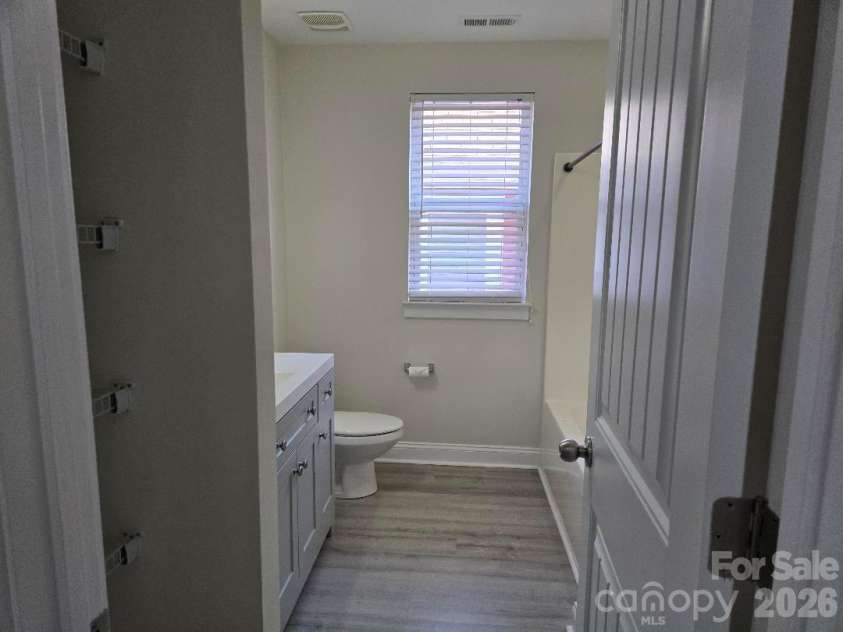 15947 Rose Glenn Lane, Davidson, NC 28036.  MLS# CAR4413679, YatesRealty ID 51134. Full bathroom with storage