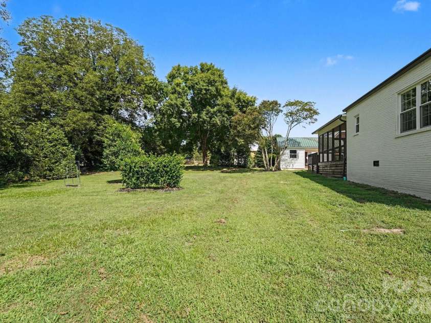 433 Main Street, Mocksville, NC 27028.  MLS# CAR4423506, YatesRealty ID 51141. Large private flat lot