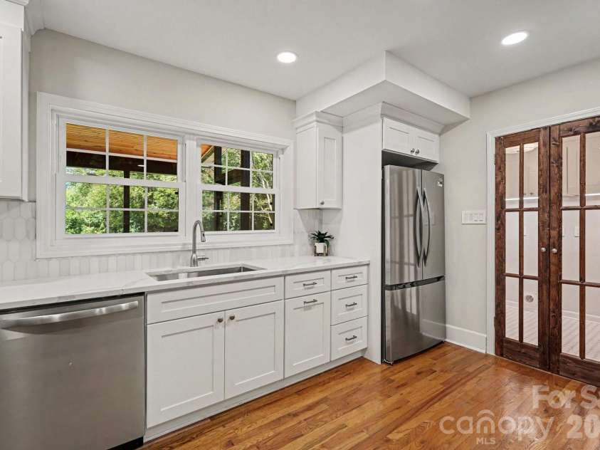 433 Main Street, Mocksville, NC 27028.  MLS# CAR4423506, YatesRealty ID 51141. Pantry  storage off kitchen