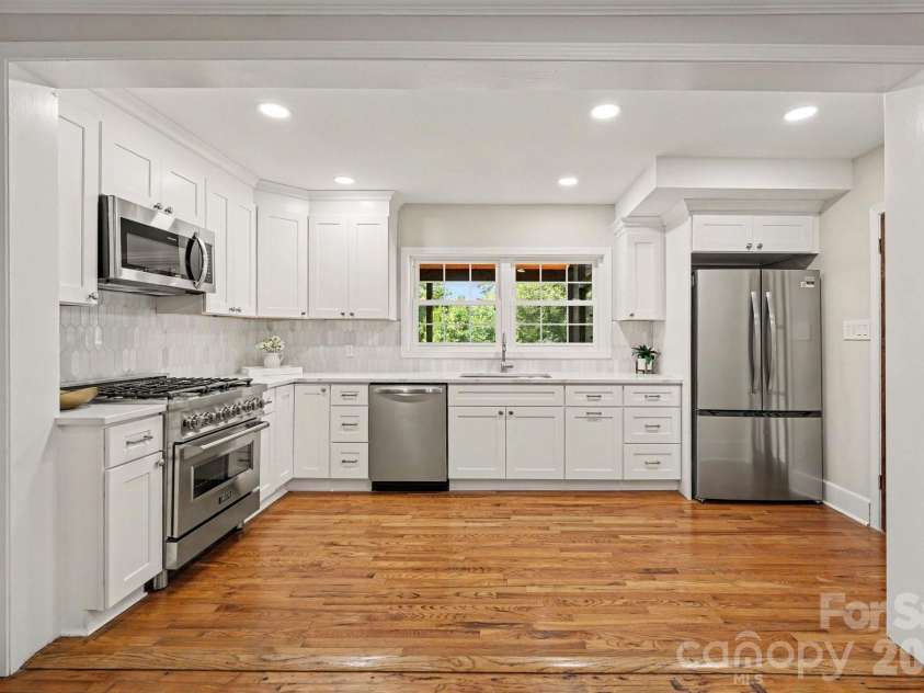 433 Main Street, Mocksville, NC 27028.  MLS# CAR4423506, YatesRealty ID 51141. Updated Kitchen looking onto back porch