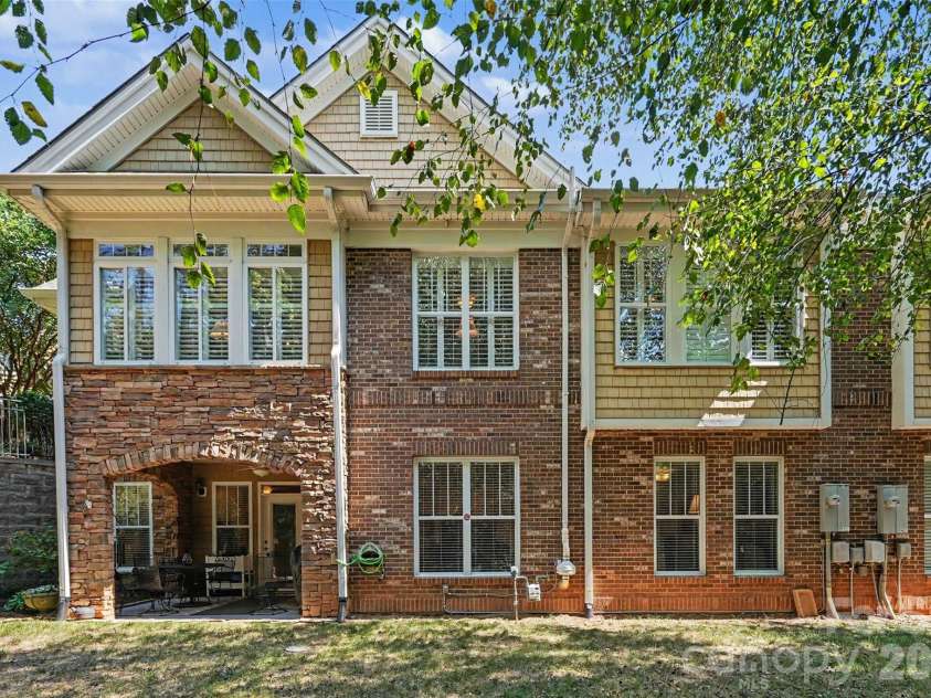 2604 Bellasera Way, Matthews, NC 28105.  MLS# CAR4425096, YatesRealty ID 51142. Backyard and patio