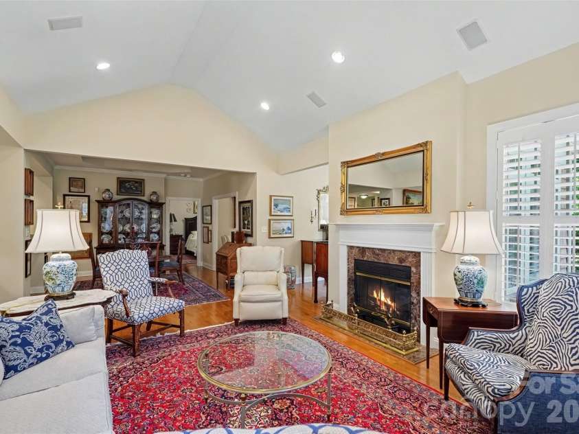 2604 Bellasera Way, Matthews, NC 28105.  MLS# CAR4425096, YatesRealty ID 51142. Family room into dining room