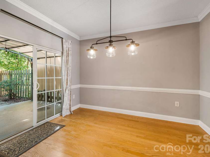 896 West Pointe Drive, Asheville, NC 28806.  MLS# CAR4420183, YatesRealty ID 51145. Dining space with outdoor access.