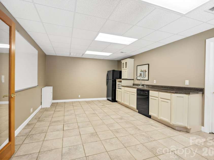 187 Duncan Creek Road, Fletcher, NC 28732.  MLS# CAR4424773, YatesRealty ID 51157. Basement kitchenette