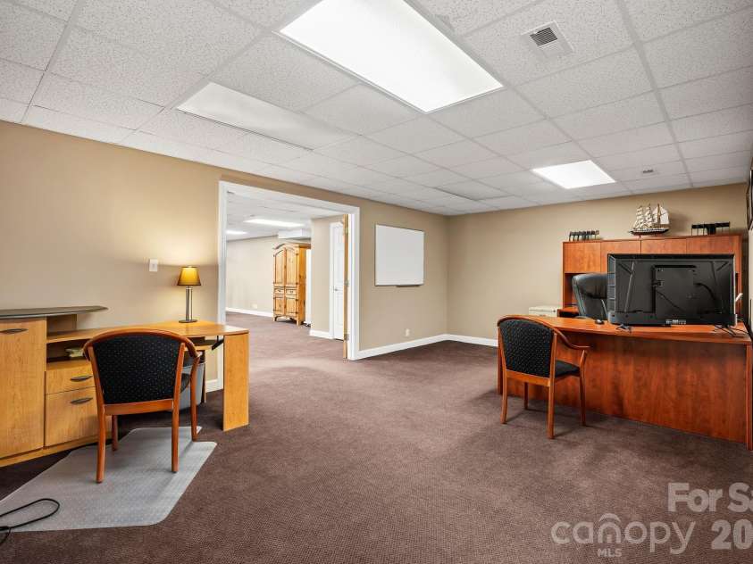 187 Duncan Creek Road, Fletcher, NC 28732.  MLS# CAR4424773, YatesRealty ID 51157. Basement office or flex room