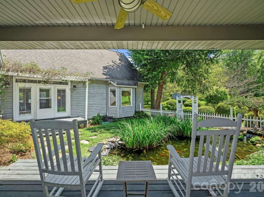 187 Duncan Creek Road, Fletcher, NC 28732.  MLS# CAR4424773, YatesRealty ID 51157. Covered porch overlooking the courtyard