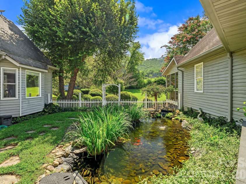 187 Duncan Creek Road, Fletcher, NC 28732.  MLS# CAR4424773, YatesRealty ID 51157. Koi Pond