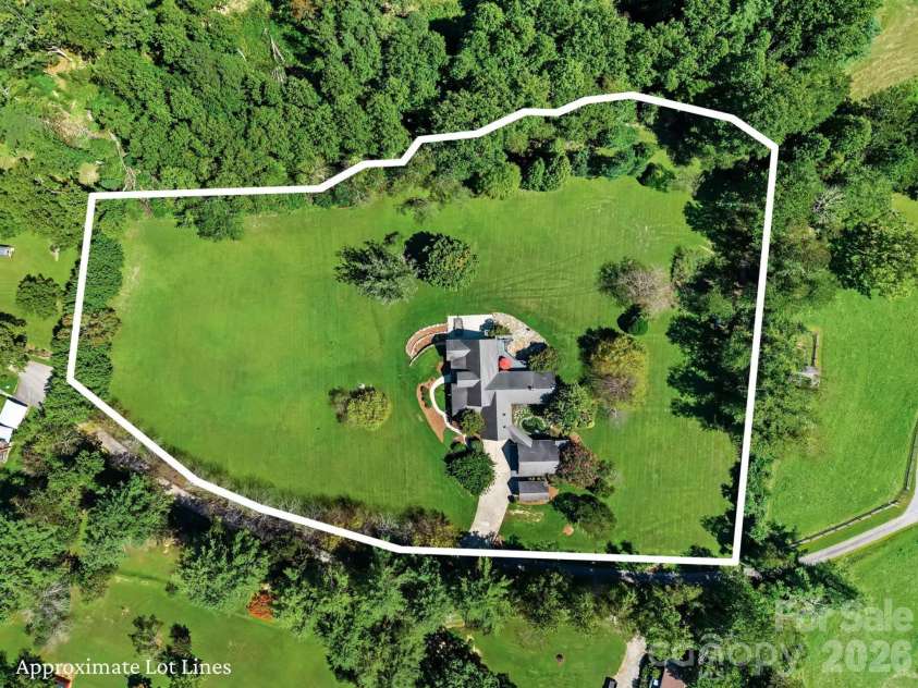 187 Duncan Creek Road, Fletcher, NC 28732.  MLS# CAR4424773, YatesRealty ID 51157. Nearly 4 level acres