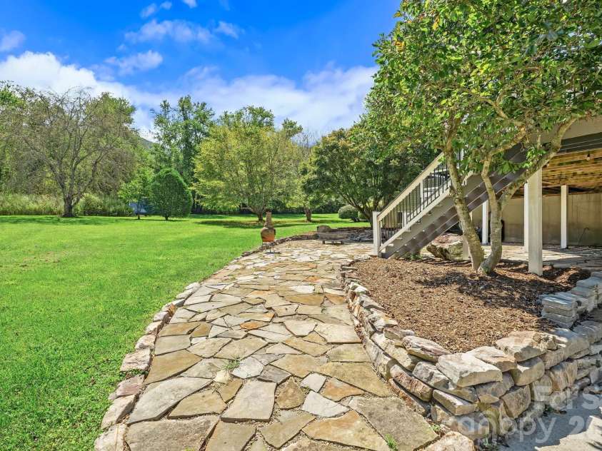 187 Duncan Creek Road, Fletcher, NC 28732.  MLS# CAR4424773, YatesRealty ID 51157. Stone patio