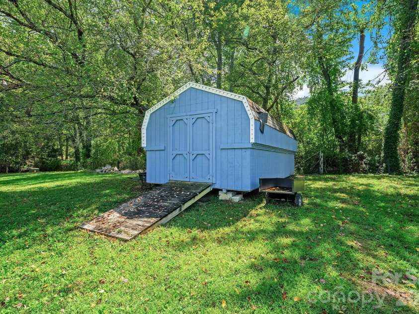 187 Duncan Creek Road, Fletcher, NC 28732.  MLS# CAR4424773, YatesRealty ID 51157. Storage shed