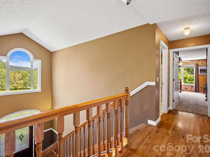 187 Duncan Creek Road, Fletcher, NC 28732.  MLS# CAR4424773, YatesRealty ID 51157. Upper-level landing