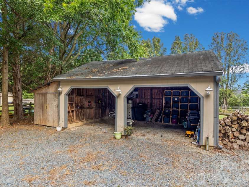 5517 Highway 218 Highway, Monroe, NC 28110.  MLS# CAR4425006, YatesRealty ID 51160. Spacious Garage/Storage