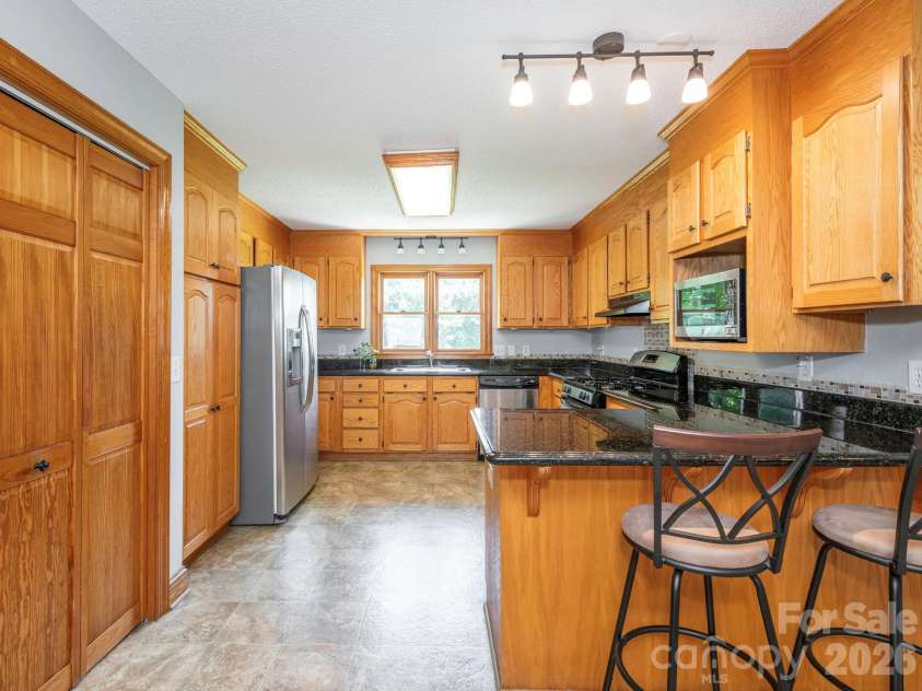 2434 Plantation Road, Concord, NC 28027.  MLS# CAR4425292, YatesRealty ID 51163. 