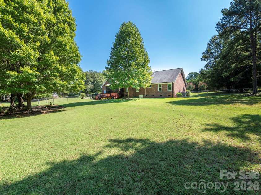 2434 Plantation Road, Concord, NC 28027.  MLS# CAR4425292, YatesRealty ID 51163. Huge backyard