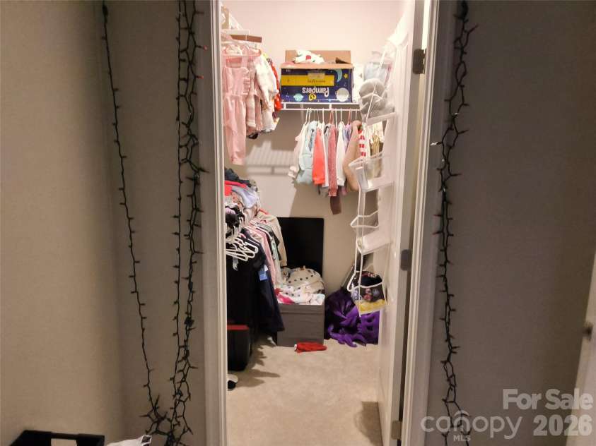 1205 May Apple Drive, Matthews, NC 28104.  MLS# CAR4425216, YatesRealty ID 51165. Bedroom 3 closet