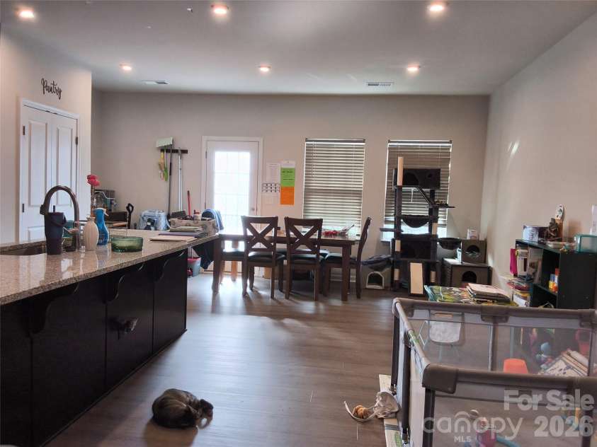 1205 May Apple Drive, Matthews, NC 28104.  MLS# CAR4425216, YatesRealty ID 51165. Main, kitchen to dinning