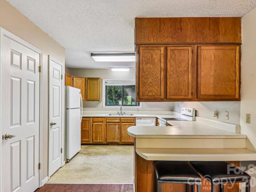 53 Lake Drive, Laurel Park, NC 28739.  MLS# CAR4425310, YatesRealty ID 51166. 