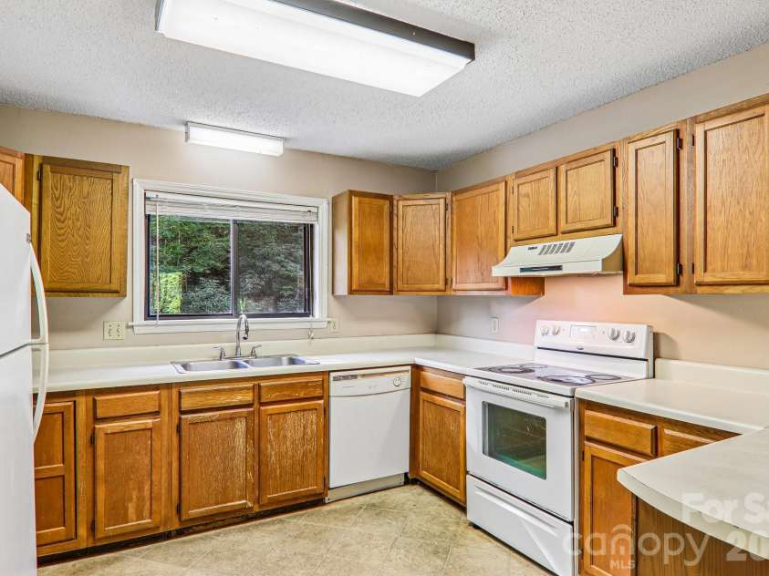 53 Lake Drive, Laurel Park, NC 28739.  MLS# CAR4425310, YatesRealty ID 51166. 