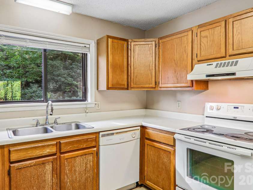 53 Lake Drive, Laurel Park, NC 28739.  MLS# CAR4425310, YatesRealty ID 51166. 