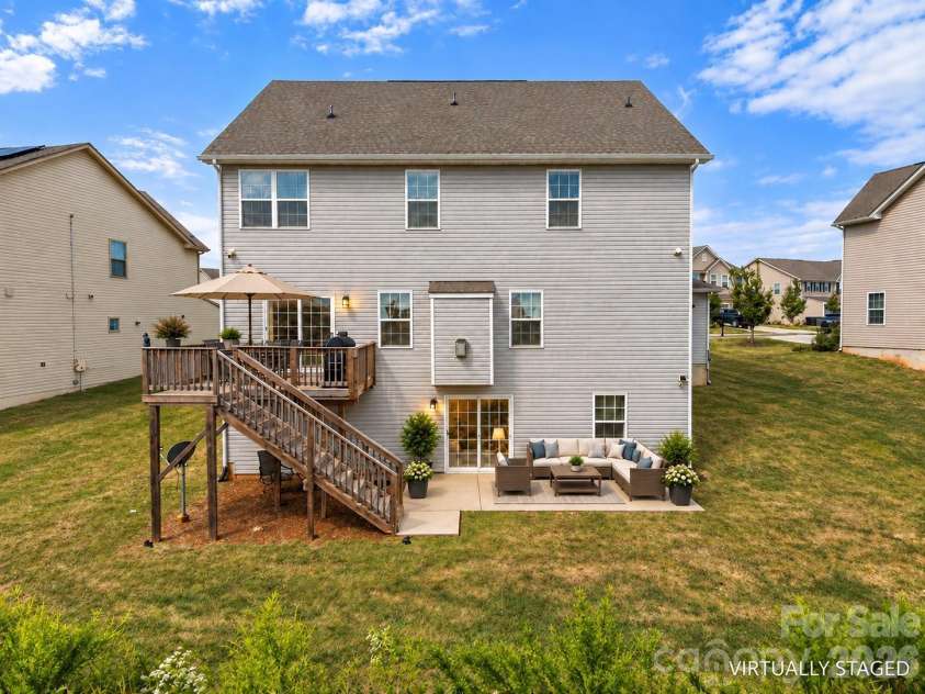 7004 Waterwheel Street, Concord, NC 28025.  MLS# CAR4417065, YatesRealty ID 51167. Virtually Staged Backyard