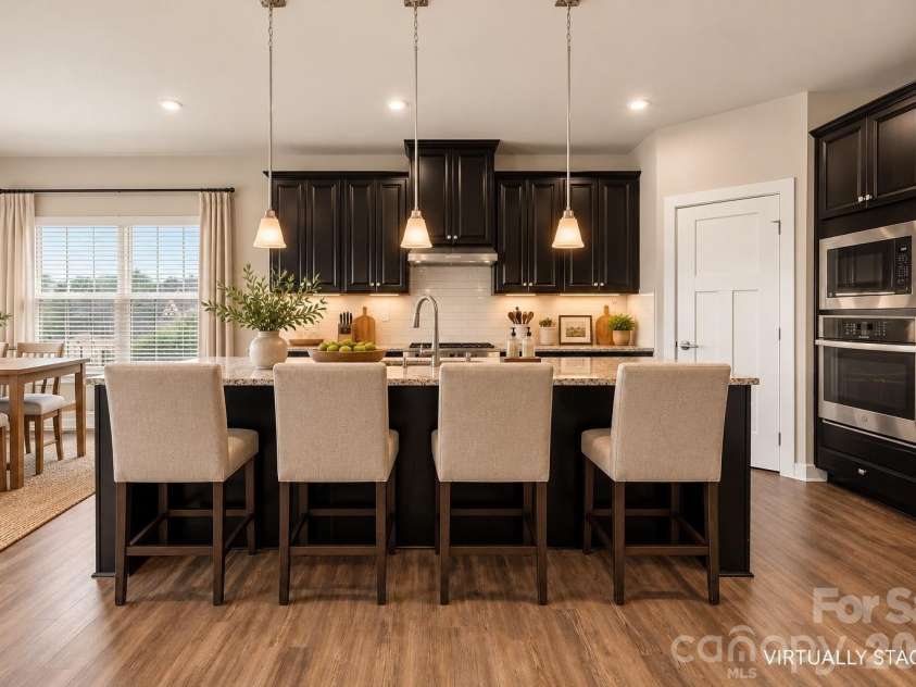 7004 Waterwheel Street, Concord, NC 28025.  MLS# CAR4417065, YatesRealty ID 51167. Virtually Staged Kitchen/Dining Area