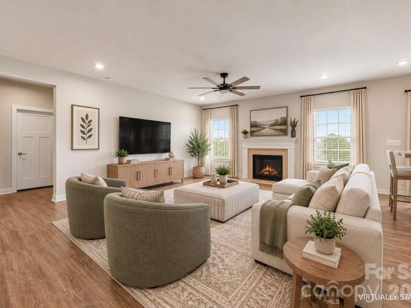 7004 Waterwheel Street, Concord, NC 28025.  MLS# CAR4417065, YatesRealty ID 51167. Virtually Staged Living Room