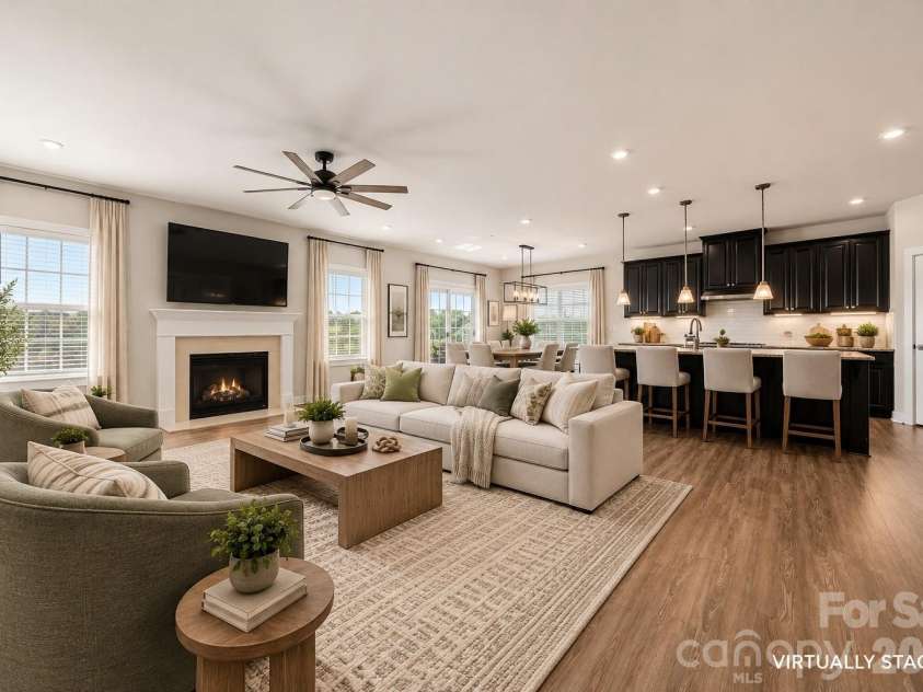 7004 Waterwheel Street, Concord, NC 28025.  MLS# CAR4417065, YatesRealty ID 51167. Virtually Staged Living Room