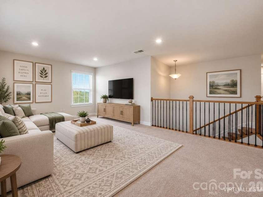 7004 Waterwheel Street, Concord, NC 28025.  MLS# CAR4417065, YatesRealty ID 51167. Virtually Staged Loft