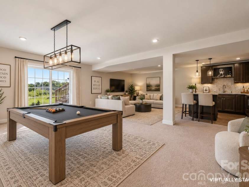 7004 Waterwheel Street, Concord, NC 28025.  MLS# CAR4417065, YatesRealty ID 51167. Virtually Staged Recreational Room