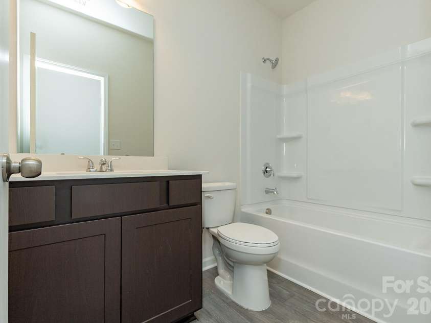 6116 Jasmine Branch Road, Charlotte, NC 28216.  MLS# CAR4425461, YatesRealty ID 51171. Hall Bathroom