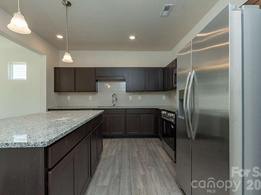 6116 Jasmine Branch Road, Charlotte, NC 28216.  MLS# CAR4425461, YatesRealty ID 51171. Kitchen