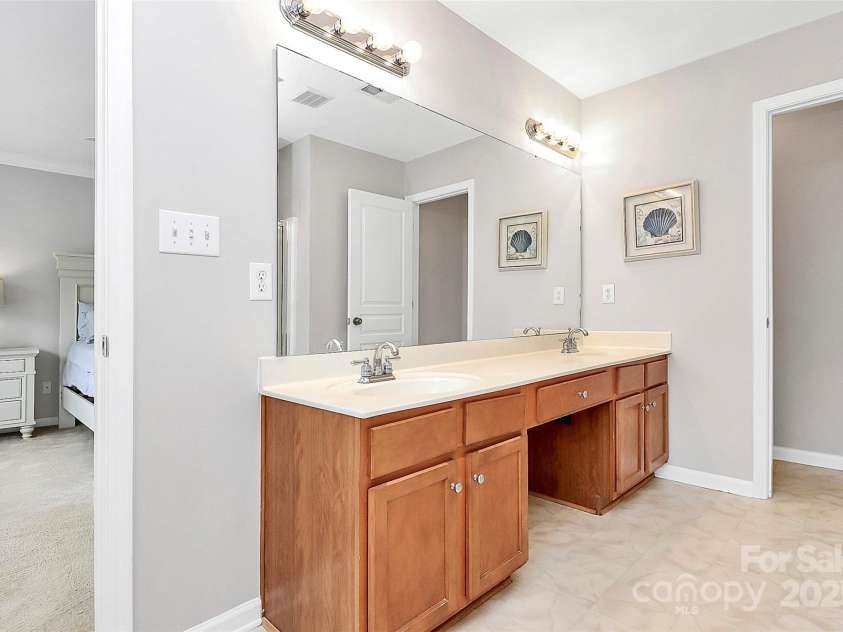 18710 Coverdale Court, Cornelius, NC 28031.  MLS# CAR4235258, YatesRealty ID 5118. Dual Vanity and Private Water Closet!