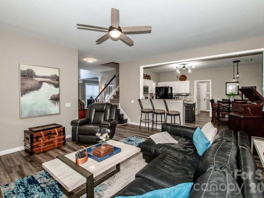 111 Comata Road, Mooresville, NC 28117.  MLS# CAR4423905, YatesRealty ID 51181. Family room looking towards kitchen view 2