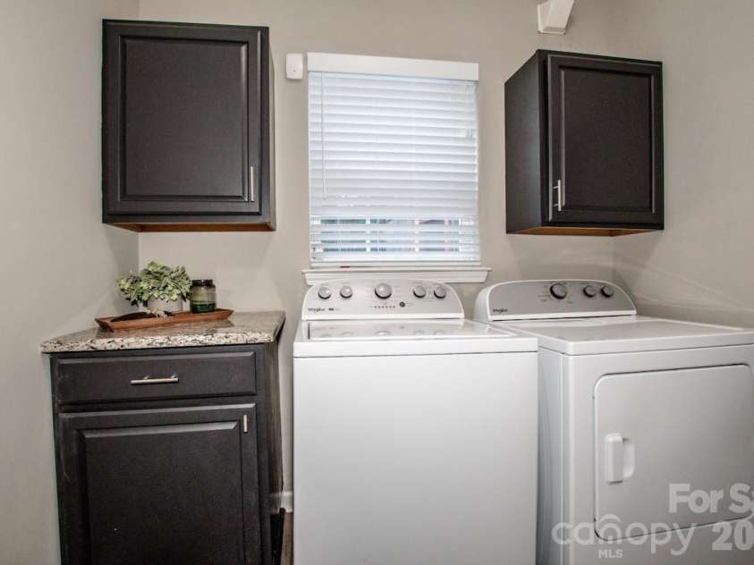 111 Comata Road, Mooresville, NC 28117.  MLS# CAR4423905, YatesRealty ID 51181. Laundry room with built in cabinets