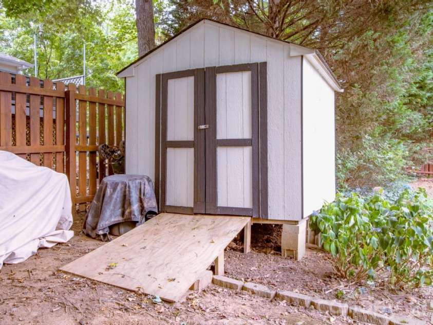 111 Comata Road, Mooresville, NC 28117.  MLS# CAR4423905, YatesRealty ID 51181. Shed in fenced backyard